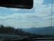 1995 Ford C-350 (Centurion Conversions) - Driving through mountains on a cloudy day, as seen from the driver's perspective.