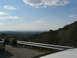 1995 Ford C-350 (Centurion Conversions) - A scenic view from a roadside overlook on a partly cloudy day.
