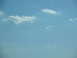 1995 Ford C-350 (Centurion Conversions) - A clear blue sky with wispy clouds drifting by.