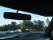 1995 Ford C-350 (Centurion Conversions) - Looking out from inside a vehicle at other cars driving on the highway.