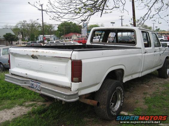 White Ford pickup truck rear view