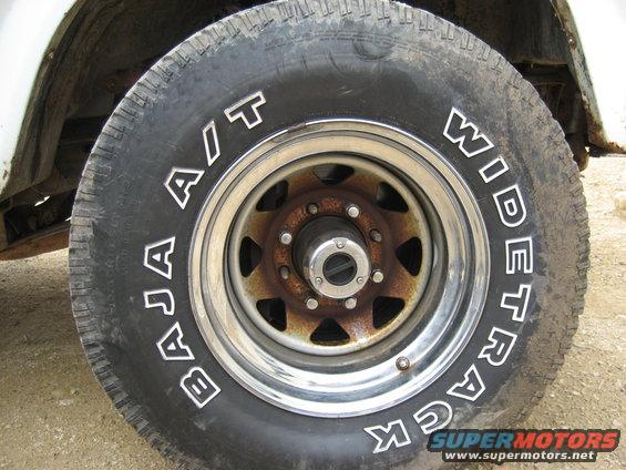 Close-up of a Baja A/T Widetrack tire on a rusty wheel