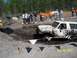 1989 Ford Bronco - This vehicle is covered in mud while navigating an off-road course.