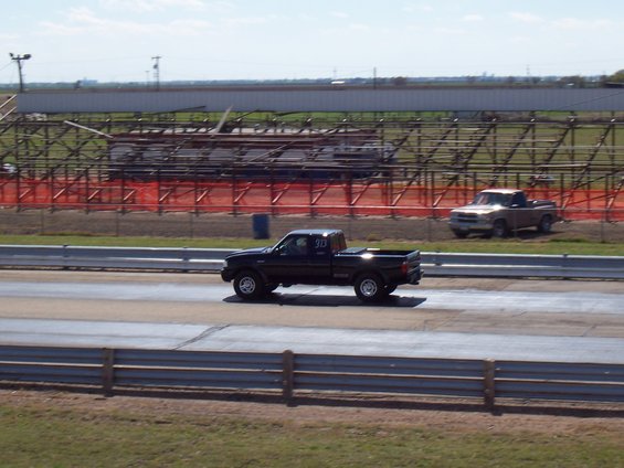 2003 Ford Ranger and another pickup truck on a drag strip