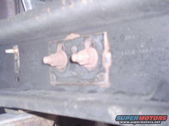 Crossmember with two bolts and mounting plate