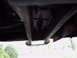 1997 Ford F-150 - Underbody view of a vehicle's crossmember, showing structural components and fasteners.