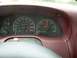 1997 Ford F-150 - The dashboard gauges show the vehicle is traveling at 85 mph with the engine running at 3000 RPM.