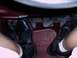 1997 Ford F-150 - Close-up view of the brake, clutch, and accelerator pedals inside a vehicle.