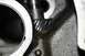 1972 Ford Ranchero - Detail of an engine component, possibly a gear within a block, with visible text 'SUPER MOTORS'.