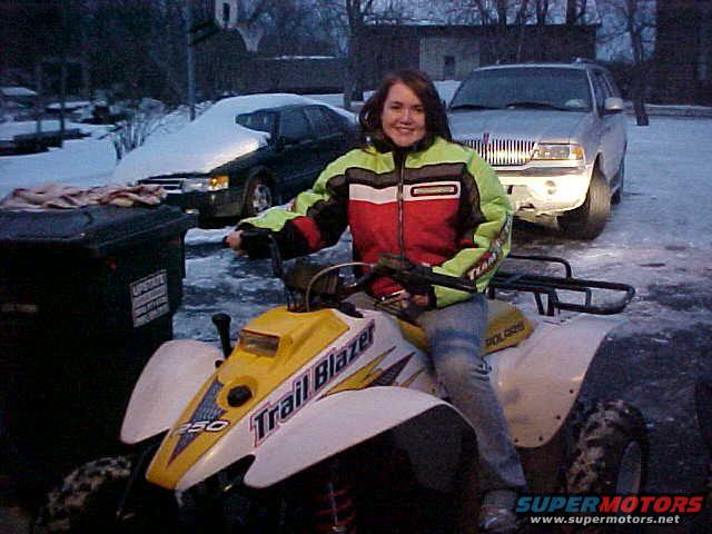 Arctic Cat jacket  plus my new quad =  LOVE