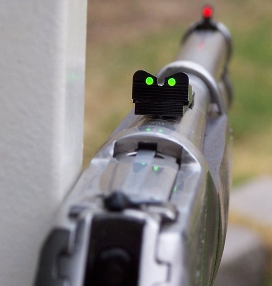 Pistol sights with green front dots and red rear sight