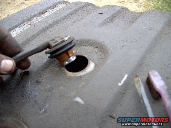 img_0402.jpg The vent valve popped out very easily (Thank goodness). So many people bust these things removing them.