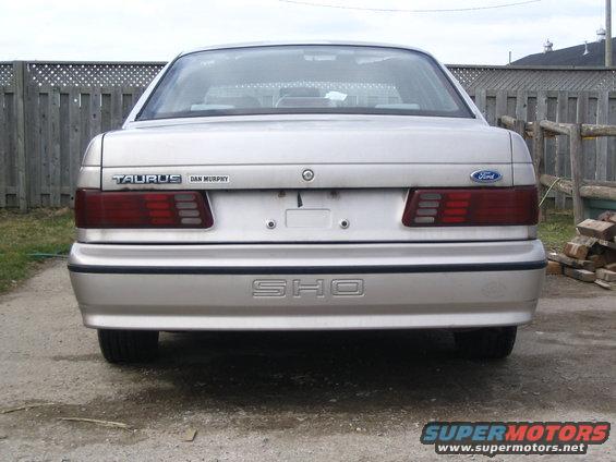 Rear of a silver Ford Taurus SHO with 'TAURUS' and 'DAN MURPHY' badges