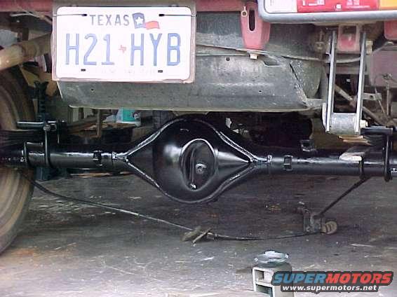 Texas license plate H21-HYB above a black rear axle assembly