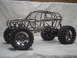 1993 Ford Bronco - This custom-built rock crawler features a prominent tube frame chassis and oversized off-road tires.