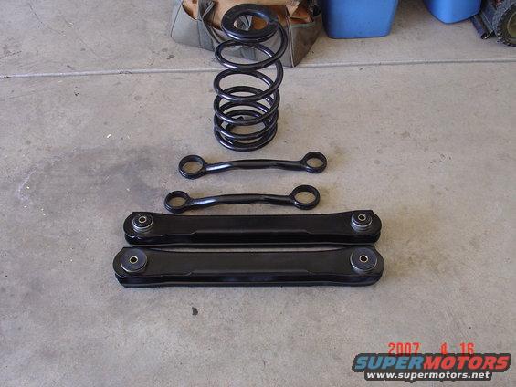 the lower controle arms with the bushings pressed in, new springs