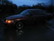 2001 Ford Crown Victoria - A 2001 Ford Crown Victoria is seen from the front quarter angle at dusk.