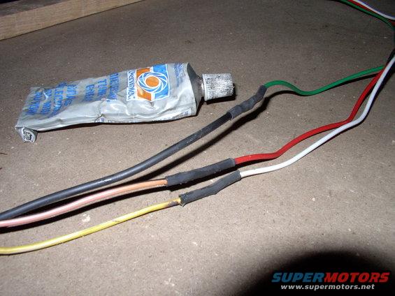 img_0431.jpg Can't afford any more corrosion, than those wires already had. This time Iubed the soldered joints up with dielectric grease before heat shrinking over top of them.