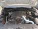 2000 Ford Crown Victoria - Engine bay of a 2000 Ford Crown Victoria, showing the V8 engine components.