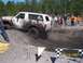 1989 Ford Bronco - A white 1989 Ford Bronco navigates a muddy obstacle course during an event in 2007.