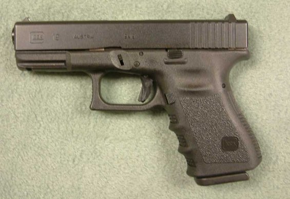 Black Glock 19 pistol, side view, with 'Glock 19 Austria' visible