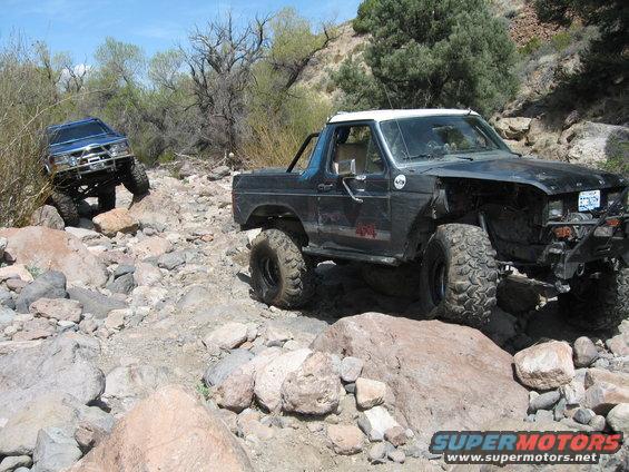 The rock I am on is what caused the break.
Going over it, Norm got his rear end on another rock and got a little throttle happy, resulting in the leaf breaking