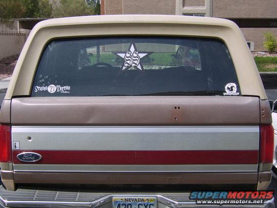 1990 Ford Bronco rear with Studio 2D Tattoo and SS star stickers on the window