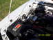 1991 Ford Mustang - Close-up of an engine bay a K&N air filter and various engine components.
