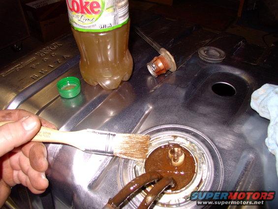 img_0472.jpg There's my favourite anti-rust grease in action(painted the floor above the tank while it was out too). After seeing the rusted mess it was coming out, and noting the advanced rust on the sender unit, thought I'd better do something to protect things there.