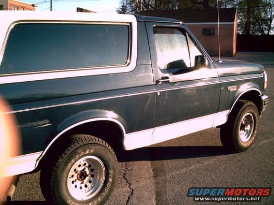 Dark blue and white 1993 Ford Bronco side view
