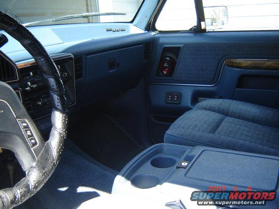 1988 Ford Bronco interior showing dashboard, steering wheel, and passenger seat