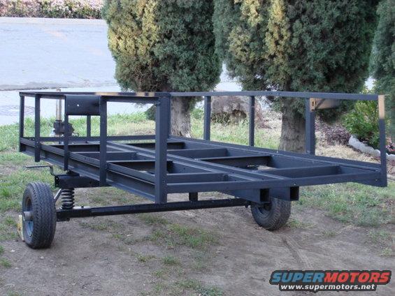 trailer-almost-done5.jpg i got the sides all welded in place.and a coat of flat black on the metal.
