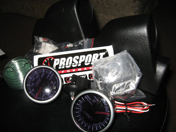 Prosport boost and air/fuel ratio gauges with black A-pillar pods