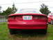 1996 Ford Probe - Rear view of a 1996 Ford Probe with missing taillights and a Washington license plate.