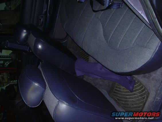 Interior view of dark blue cloth seats and dark blue vinyl trim