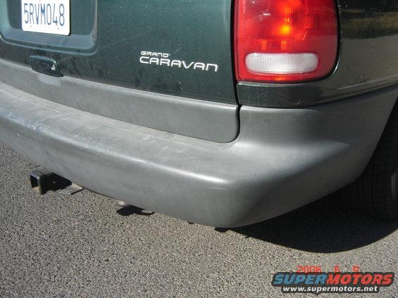 1997 Dodge Grand Caravan rear bumper with hitch receiver and taillight