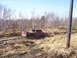 1996 Ford Bronco - Red pickup truck stuck in mud off-road.