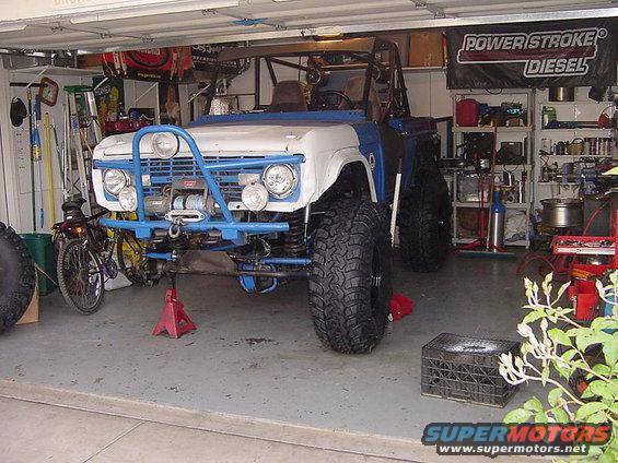 1971 Ford Bronco front view with blue roll cage and winch