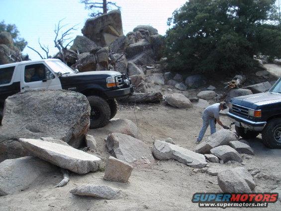 1994 Ford Bronco and another SUV on rocky trail