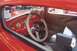2002 Ford Crown Victoria - The interior of this classic car features a custom dashboard with multiple gauges and a vintage steering wheel.