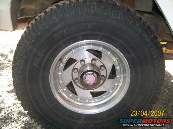 Close-up of a custom aftermarket wheel and tire on a truck