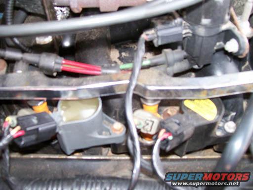 Engine ignition coils and fuel injectors with wiring harnesses