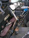 1999 Ford Crown Victoria - Close-up of an engine bay, focusing on the brake fluid reservoir and various electrical connections.