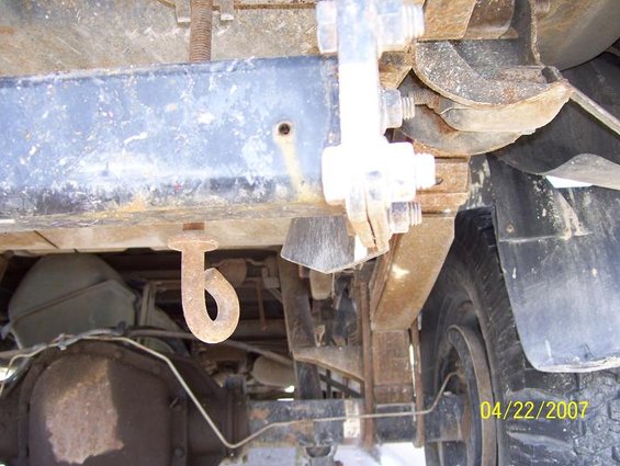 Undercarriage view of a truck, showing suspension, leaf springs, and a hook. Date stamp reads 04/22/2007