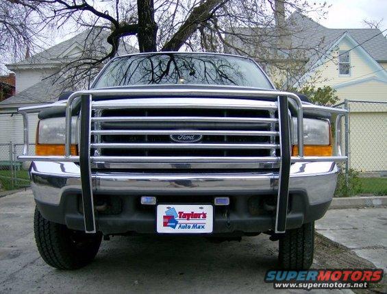 2000 Ford F-250 front view with chrome brush guard and Taylor's Auto Max license plate frame