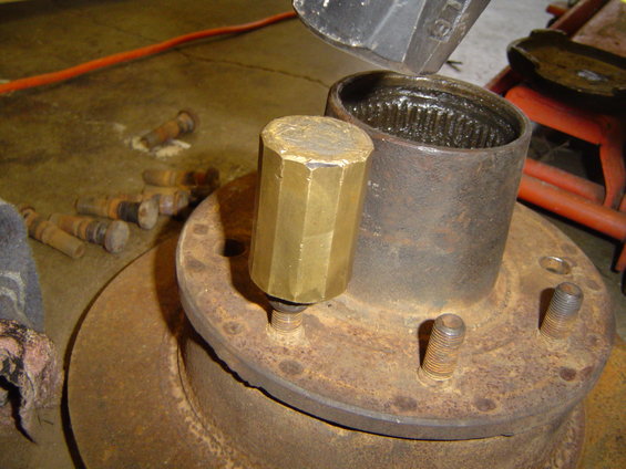 Hub with brass tool and metal sleeve