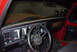 1979 Ford F-150 - The interior of a 1979 Ford F-150 shows its dashboard, steering wheel, and door panel details.