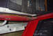 1979 Ford F-150 - The interior door sill of a truck shows signs of rust and wear, with floor mats visible above.
