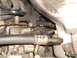 1989 Mazda MX-6 - A detailed view of various engine parts and hoses within a vehicle.