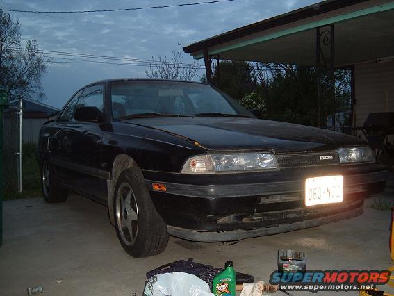 Black 1989 Mazda MX-6 3q-front view with license plate 080-NZL